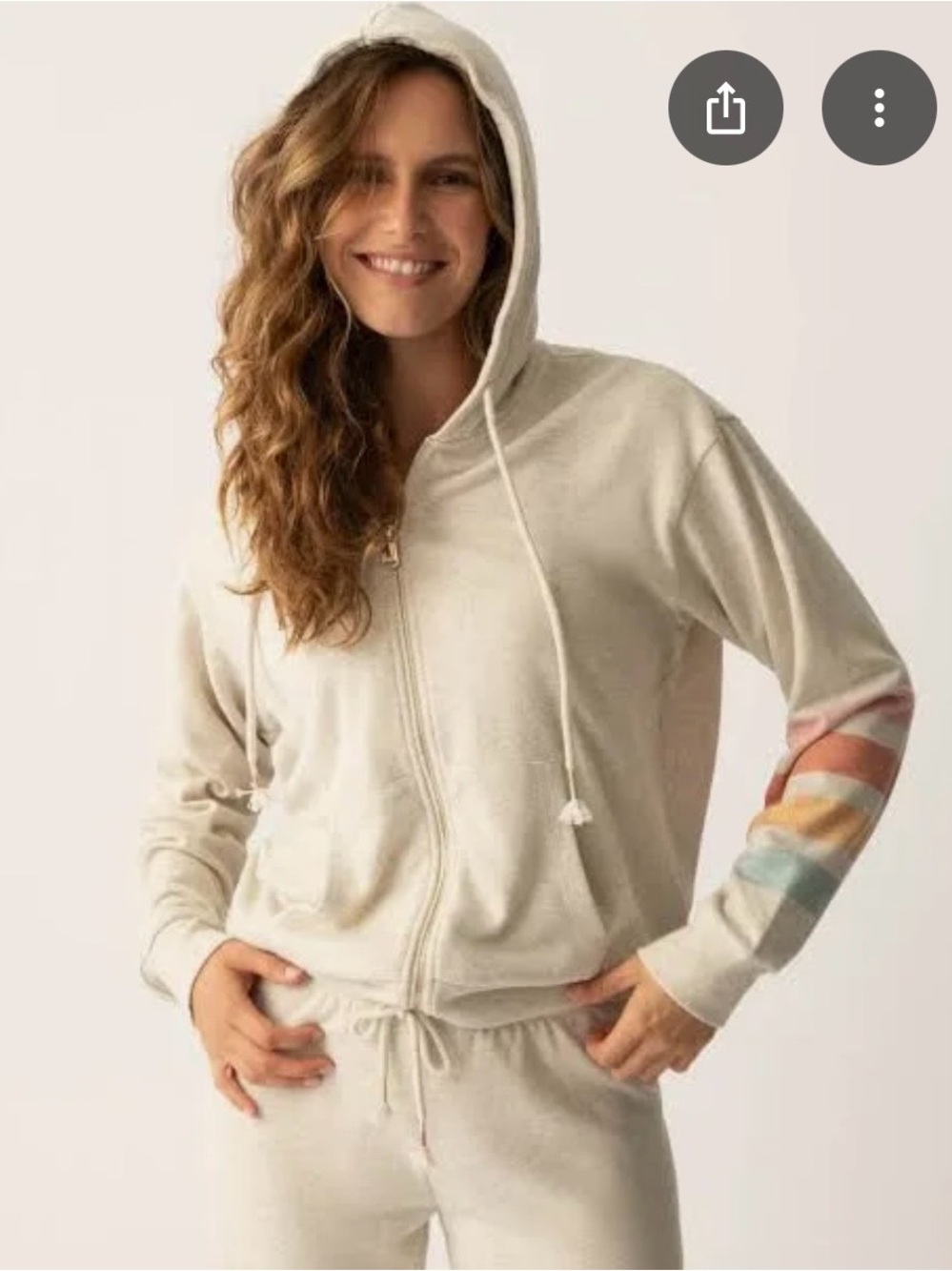 Cozy Cream Zip-Up Hoodie with Pastel Rainbow Sleeve Detail - size M